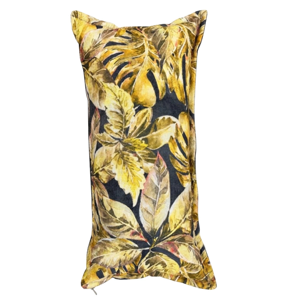 A leaf patterned scatter cushion on a white background