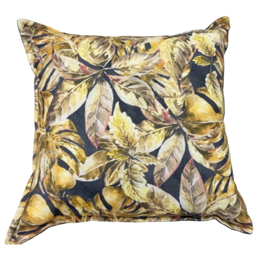 A square decorative throw pillow featuring an all-over botanical leaf pattern in shades of gold, beige, and brown on a dark navy background.