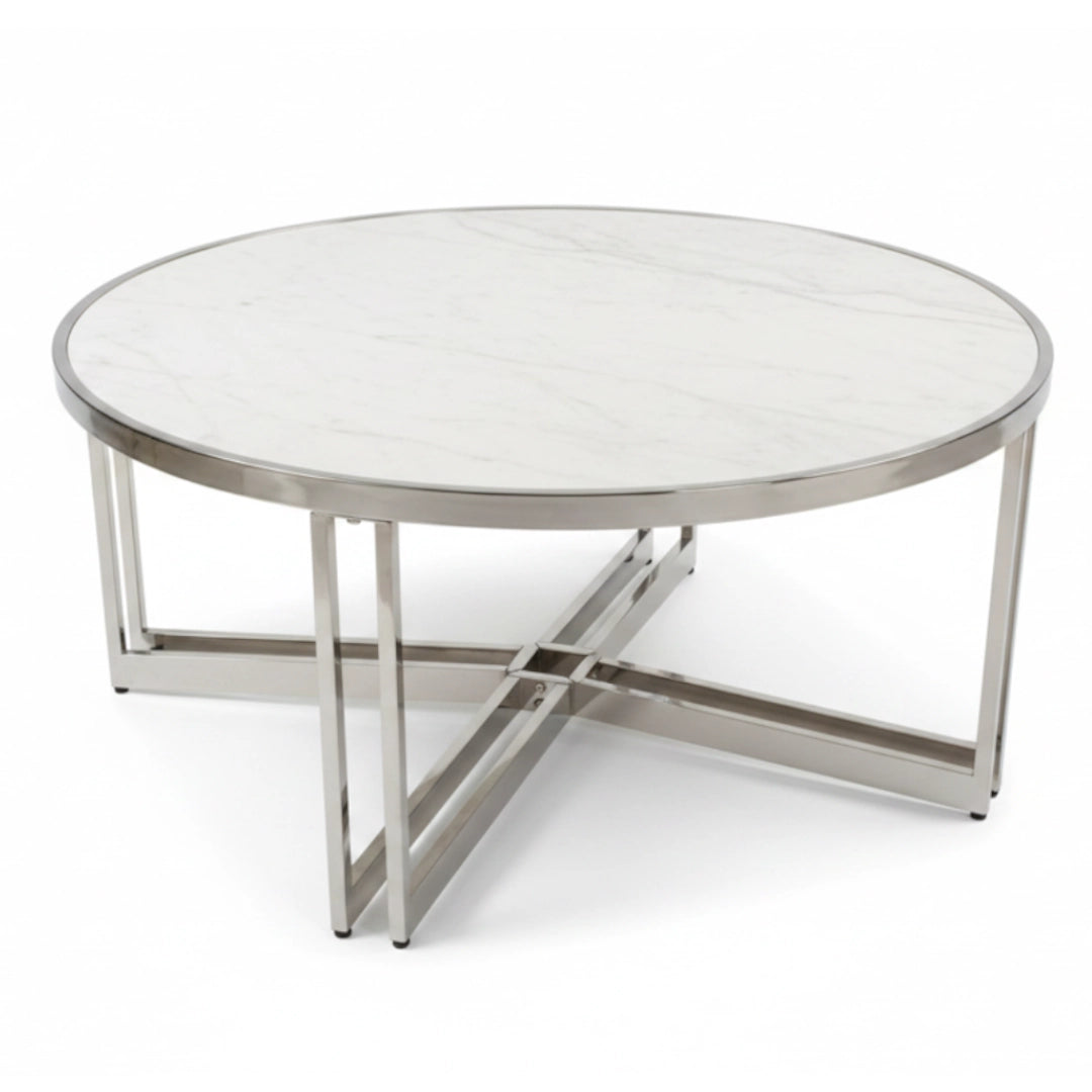 A round coffee table with a white marble-patterned top and a polished silver metal base with a crisscross design, shown on a white background.