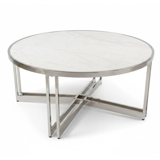 A round coffee table with a white marble-patterned top and a polished silver metal base with a crisscross design, shown on a white background.