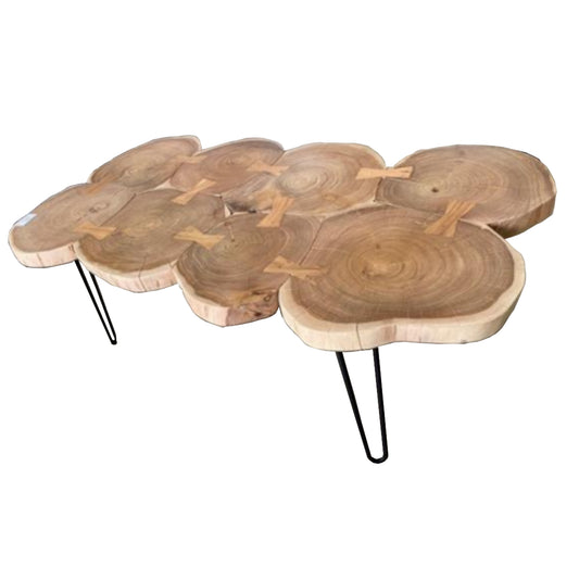 Wooden coffee table with round slices and black metal legs on a white background
