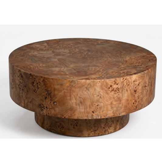 A round burl wood coffee table with a thick, chunky tiered base and a highly figured wood grain pattern, shown on a light gray background.