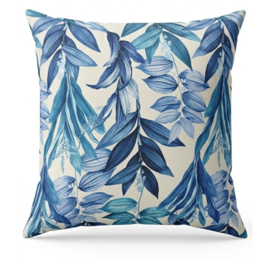 A square decorative throw pillow featuring a blue tropical leaf pattern on a cream background, shown against a plain white studio background.