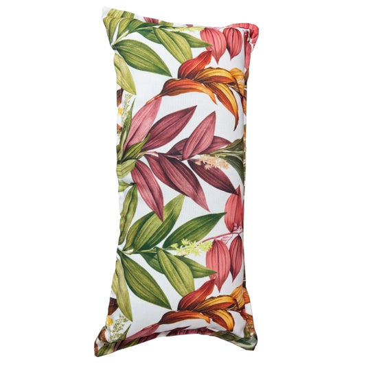 A rectangular scatter cushion with a leaf pattern on a white background