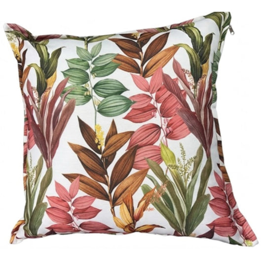 A square throw pillow featuring a botanical pattern of tropical leaves in shades of green, brown, and pinkish-red on a white background.