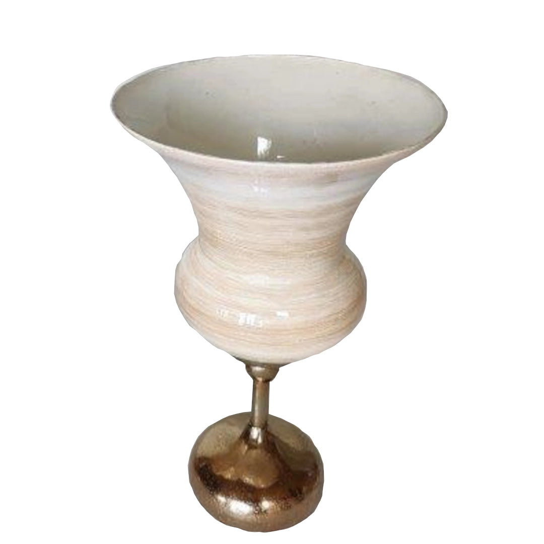 Decorative vase with a ribbed design on a white background