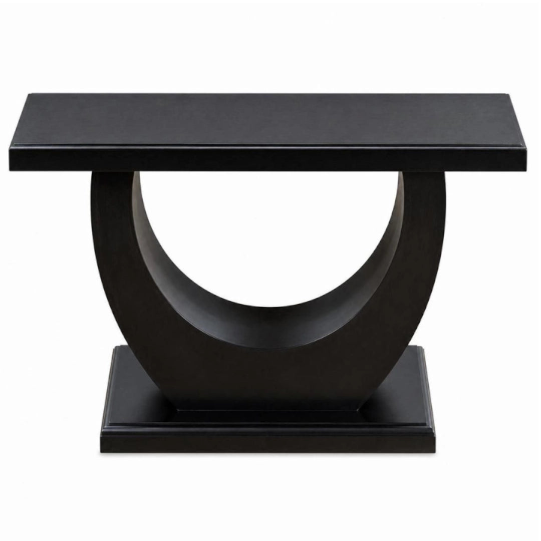 A modern black console table featuring a thick rectangular top, a large circular open-center base, and a square pedestal foot, shown against a plain white background.