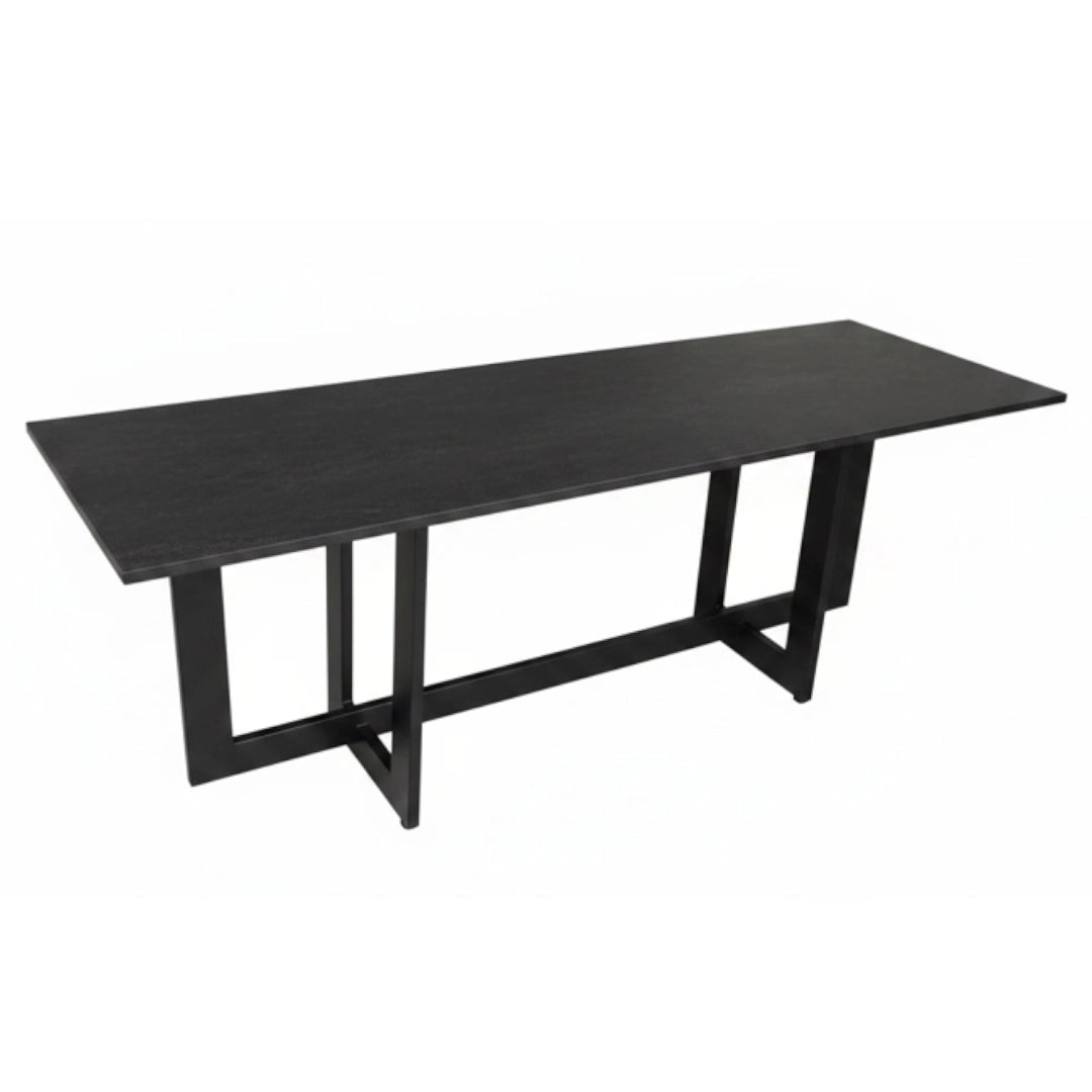 A modern black rectangular table with a dark wood-grain top and a geometric metal base, shown on a plain white background.