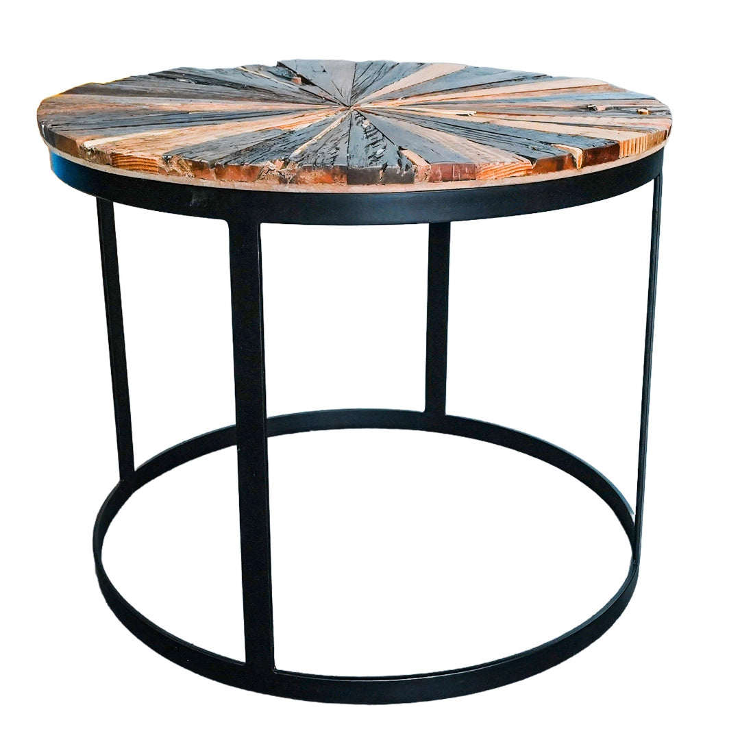 Round side table with a wooden top and black metal legs on a white background
