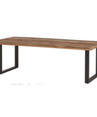 Wooden table with black metal legs on a white background