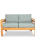 Classic outdoor two seater cedarwood couch with green & white striped canvas cushions