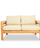 Classic outdoor two seater cedarwood couch with mustard & white striped canvas cushions
