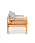 Classic outdoor two seater cedarwood couch with navy & white striped canvas cushions
