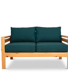 Classic outdoor two seater cedarwood couch with green canvas cushions