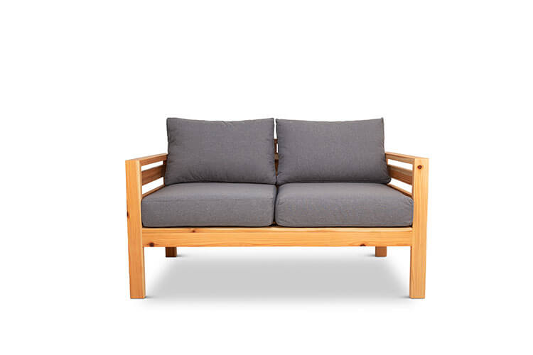 Classic outdoor two seater cedarwood couch with grey canvas cushions